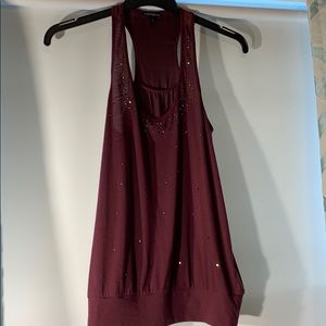 Burgundy colored racerback jeweled tank.